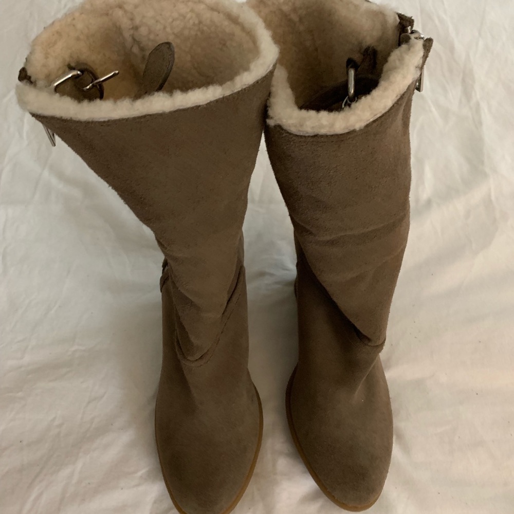 Knee length boot from Coach . Size 8 .